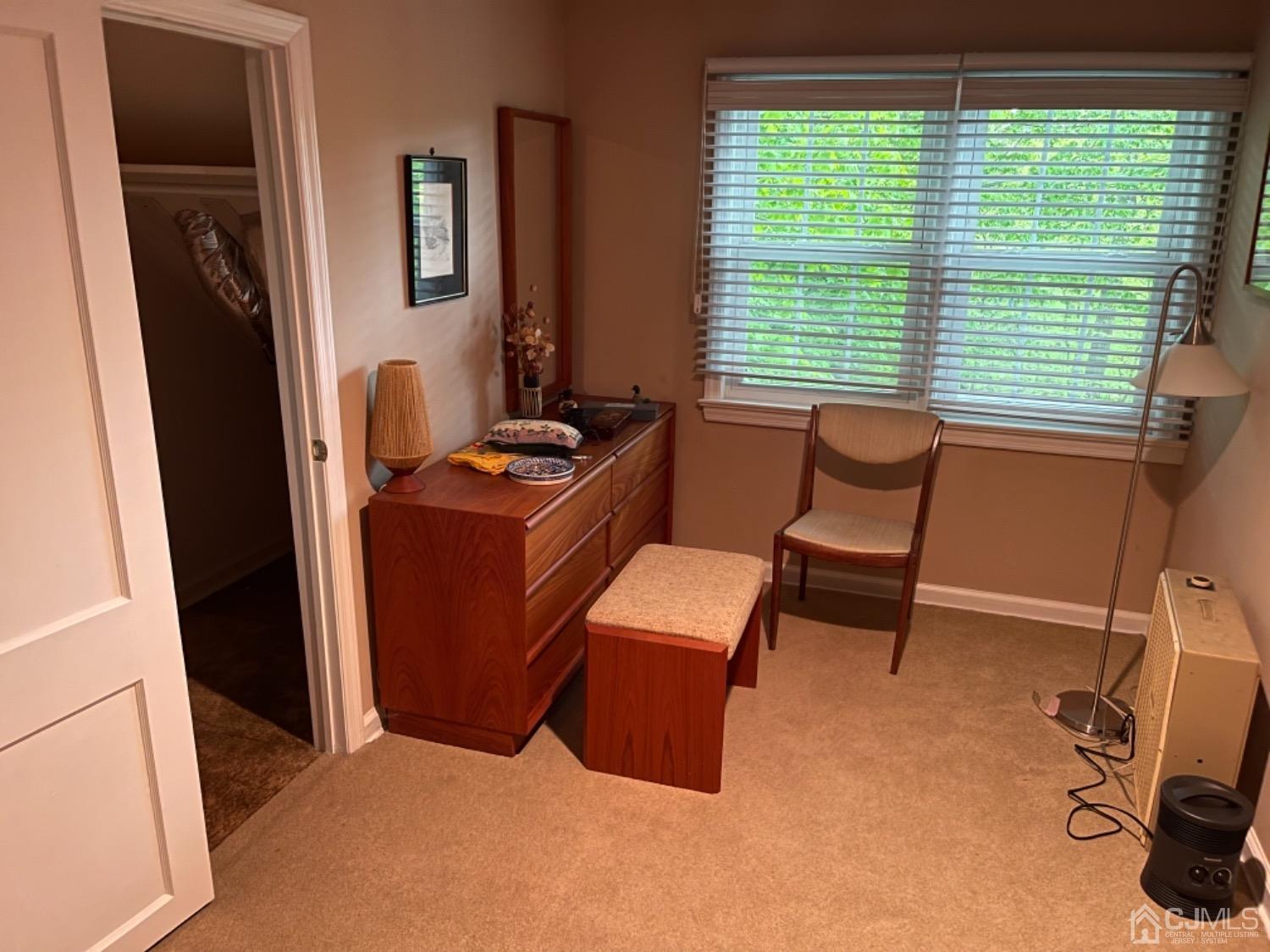 3 Lansing Place New Brunswick, NJ 08901 - Photo 3 of 29 a room with furniture and a window