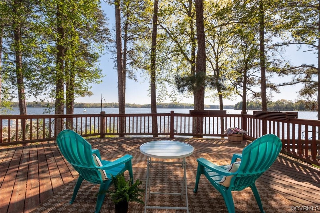 a view of a chairs in wooden deck