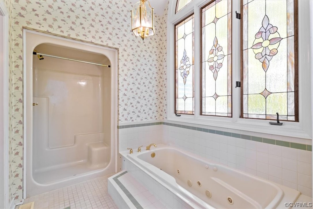 14324 Regatta Pointe Road Midlothian, VA 23112 - Photo 12 of 50 a bathroom with bathtub and window