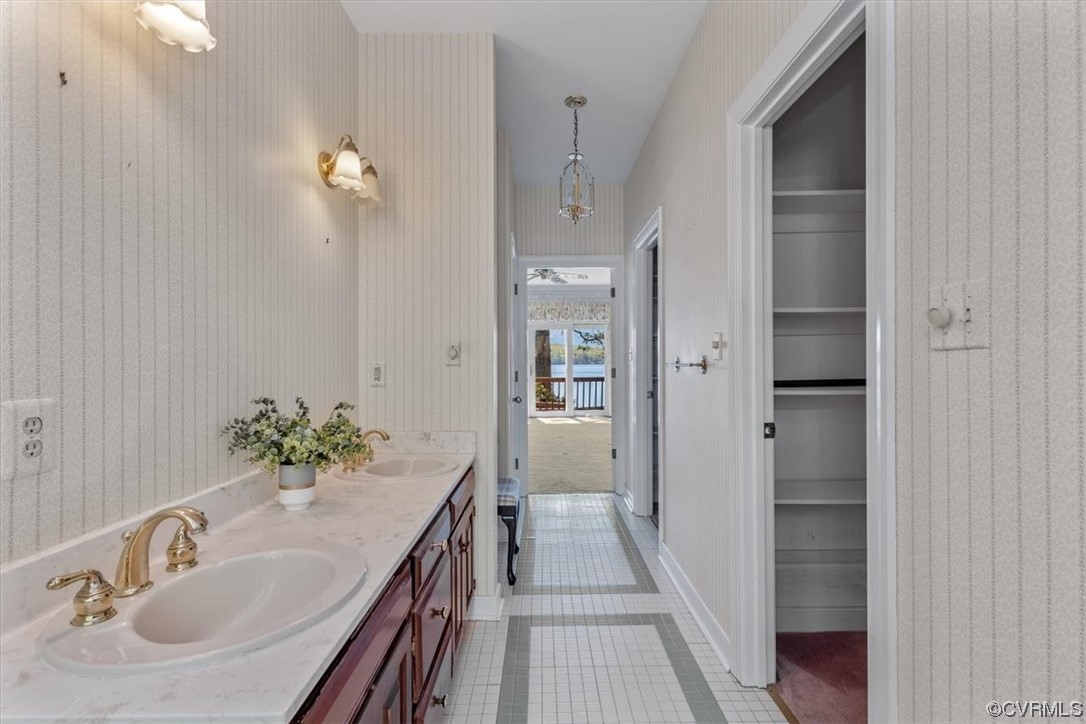 14324 Regatta Pointe Road Midlothian, VA 23112 - Photo 13 of 50 a bathroom with a tub shower and sink
