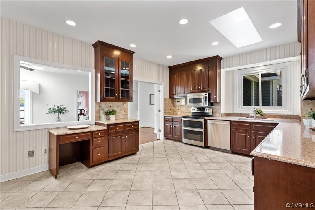 14324 Regatta Pointe Road Midlothian, VA 23112 - Photo 25 of 50 a large kitchen with stainless steel appliances lots of counter top space
