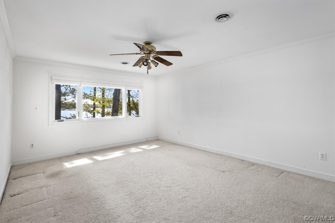 14324 Regatta Pointe Road Midlothian, VA 23112 - Photo 27 of 50 an empty room with windows and ceiling fan