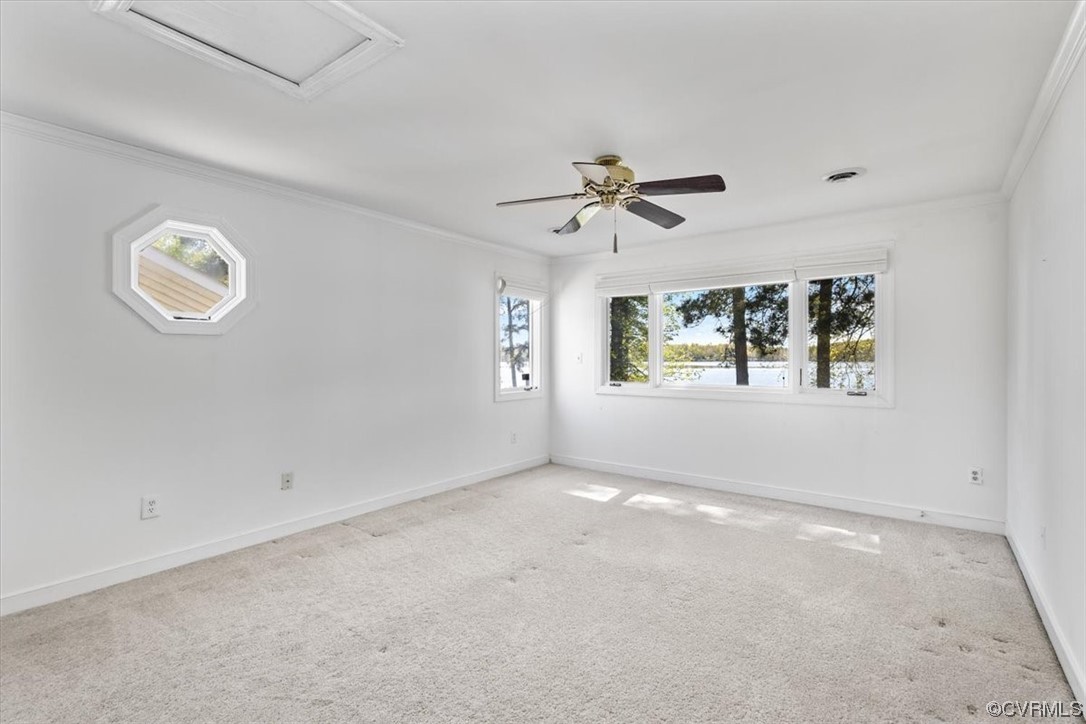 14324 Regatta Pointe Road Midlothian, VA 23112 - Photo 28 of 50 an empty room with windows and ceiling fan
