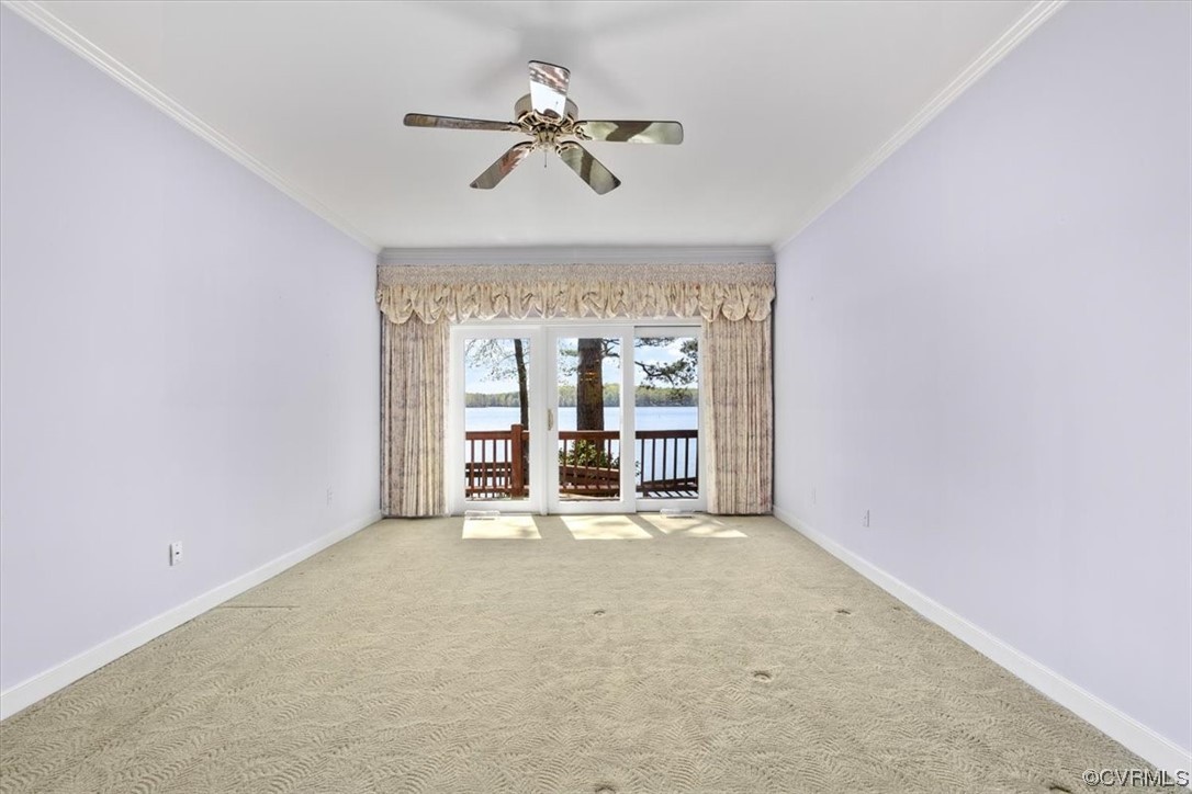 14324 Regatta Pointe Road Midlothian, VA 23112 - Photo 9 of 50 a view of an empty room with a fireplace and a window