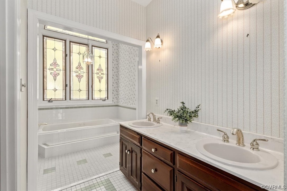 14324 Regatta Pointe Road Midlothian, VA 23112 - Photo 10 of 50 a bathroom with a sink double vanity and a bathtub