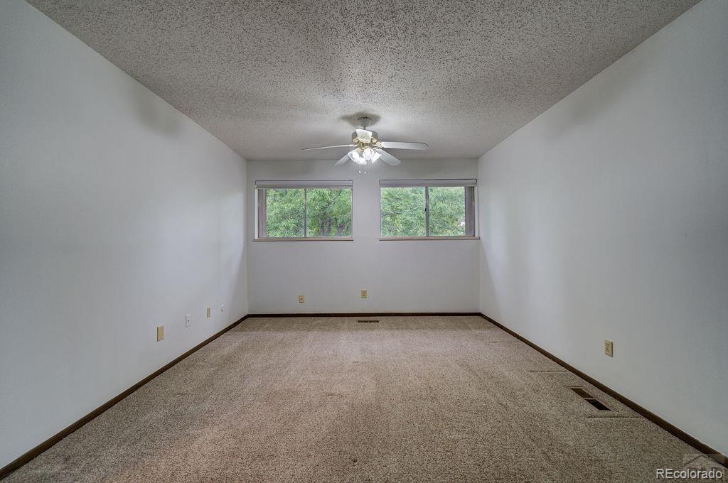 112 Scotland Road, Unit F Pueblo, CO 81001 - Photo 33 of 39 an empty room with windows and closet