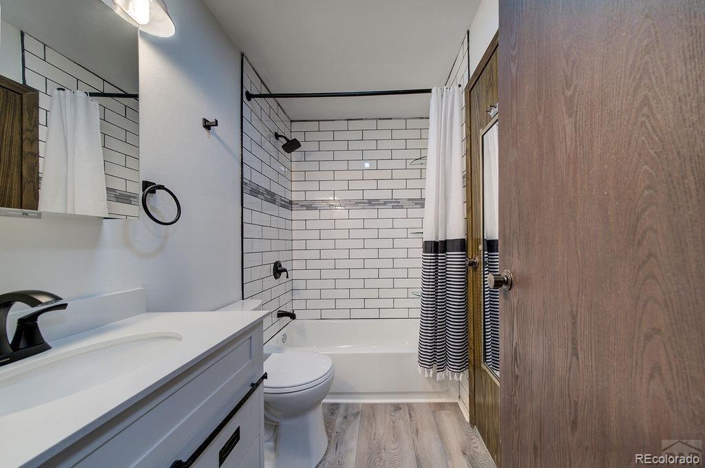 112 Scotland Road, Unit F Pueblo, CO 81001 - Photo 34 of 39 a bathroom with a sink toilet and shower