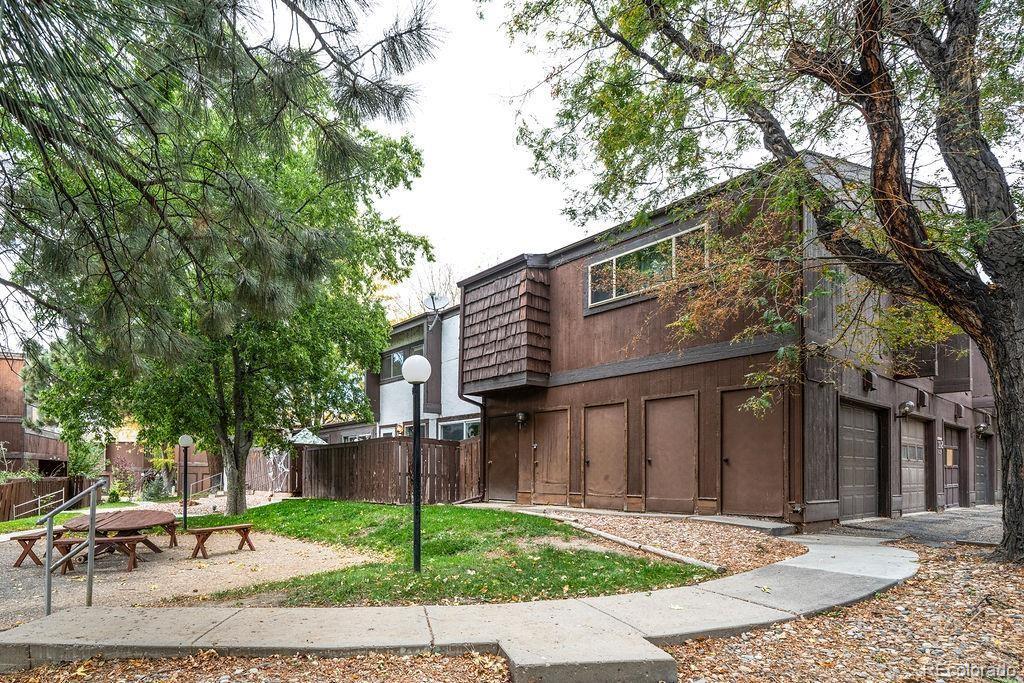 112 Scotland Road, Unit F Pueblo, CO 81001 - Photo 36 of 39 a view of a house with a yard
