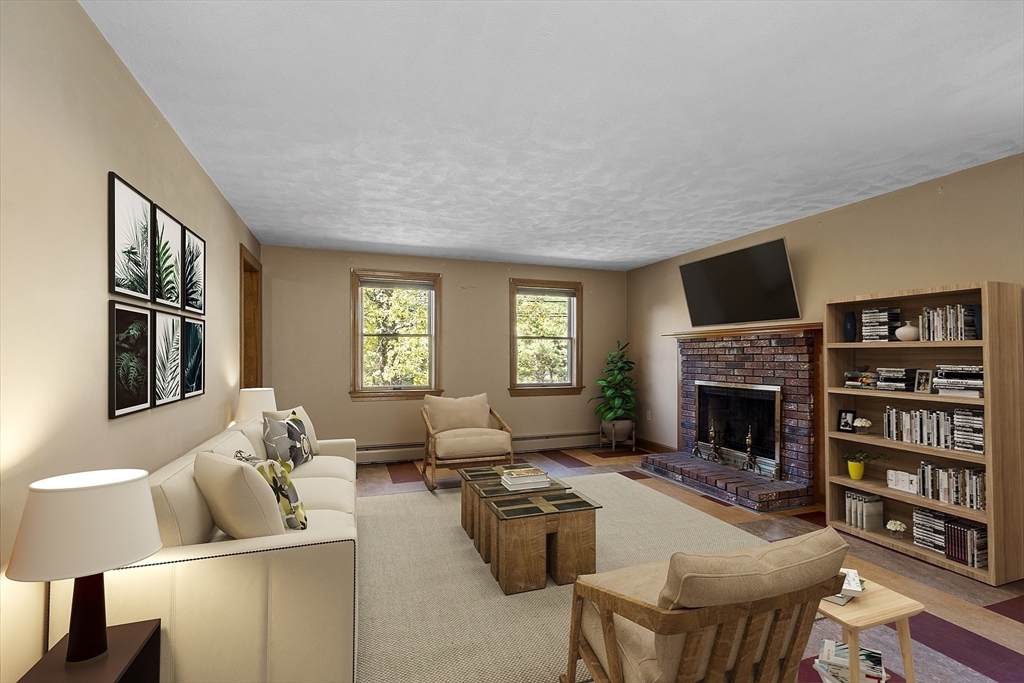 120 Concord Road Billerica, MA 01821 - Photo 16 of 42 a living room with furniture fireplace and flat screen tv