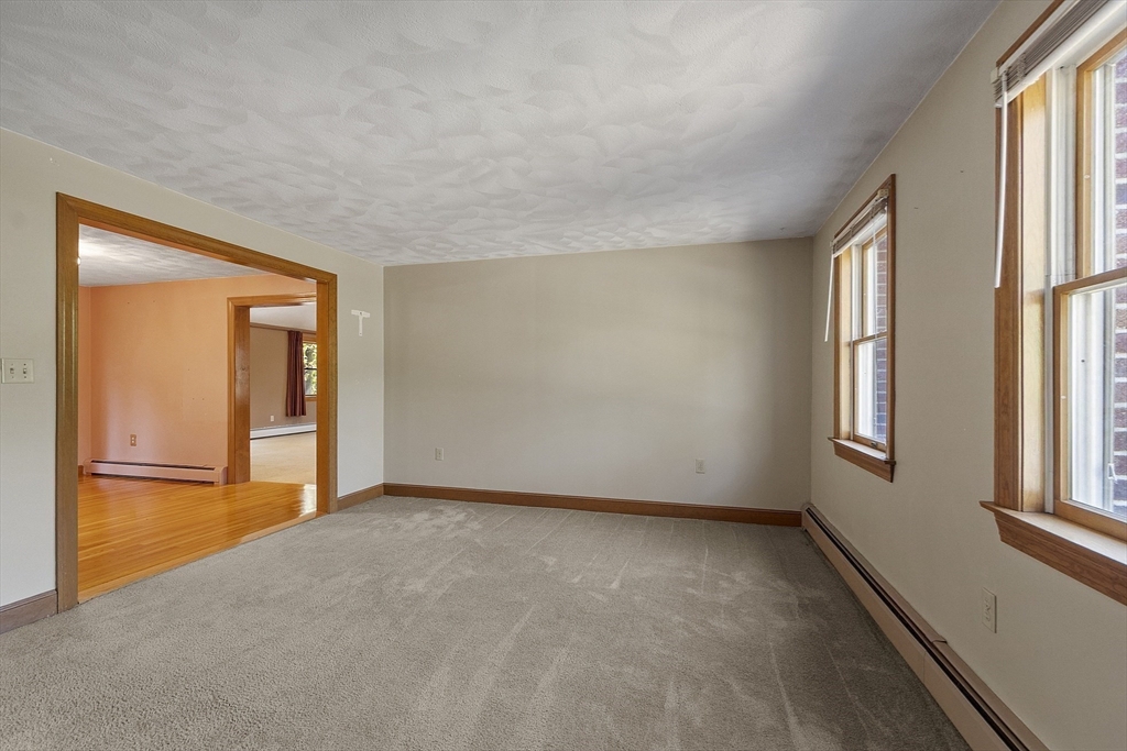 120 Concord Road Billerica, MA 01821 - Photo 21 of 42 an empty room with windows and closet