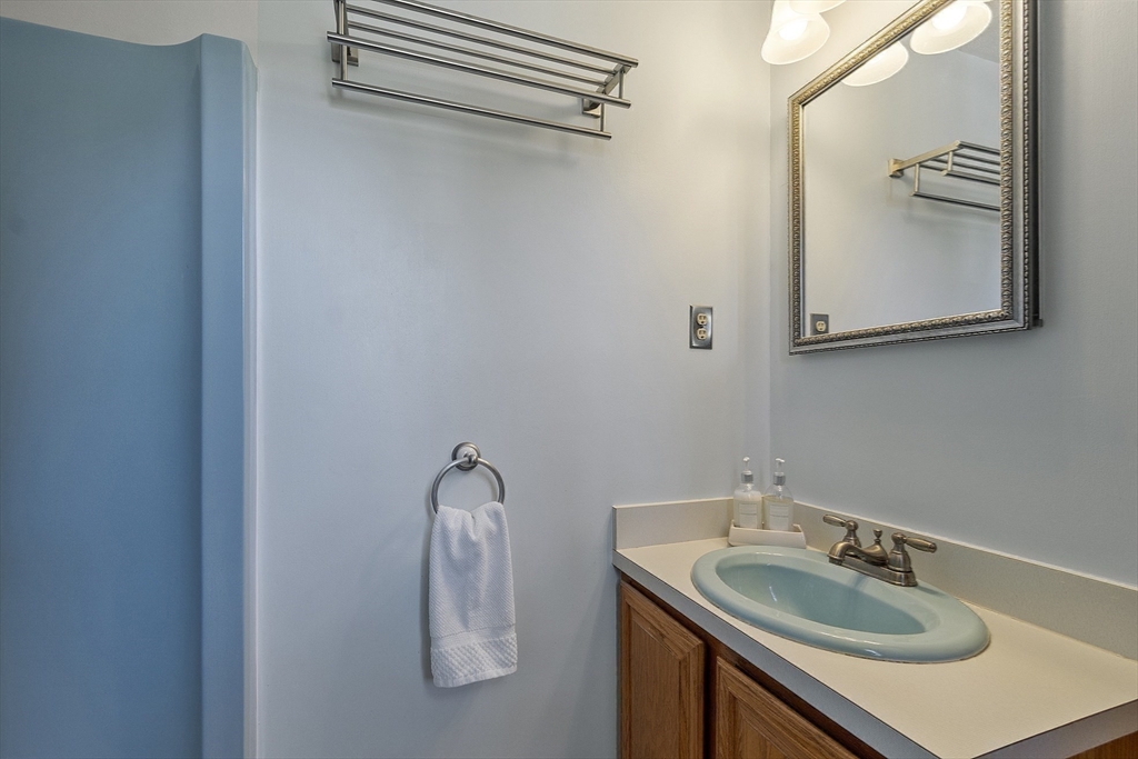 120 Concord Road Billerica, MA 01821 - Photo 29 of 42 a bathroom with a sink and a mirror