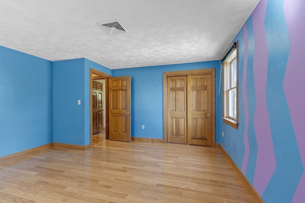120 Concord Road Billerica, MA 01821 - Photo 32 of 42 a view of an entryway with wooden floor and windows