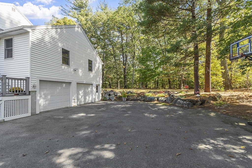 120 Concord Road Billerica, MA 01821 - Photo 4 of 42 a view of a house with a street