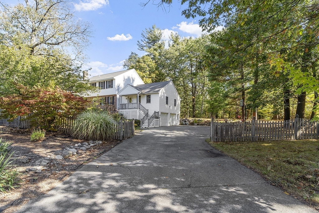 120 Concord Road Billerica, MA 01821 - Photo 5 of 42 a view of a house with a yard