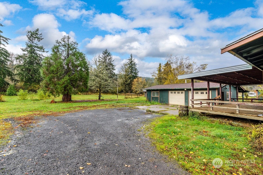 501 River Road Chehalis, WA 98532 - Photo 18 of 27 a view of a house with big yard and a large tree