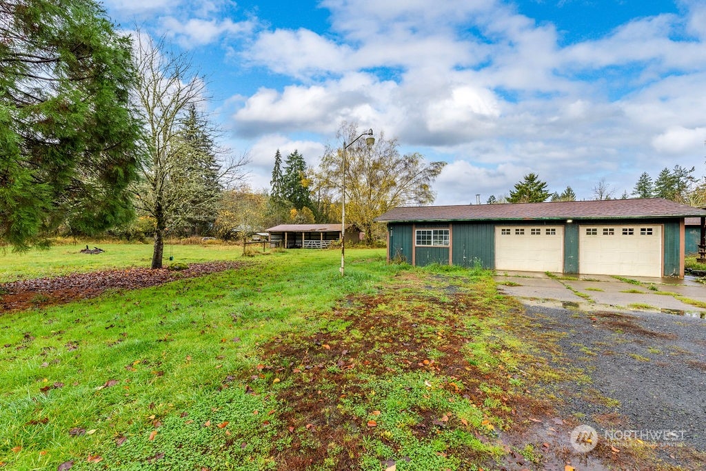 501 River Road Chehalis, WA 98532 - Photo 20 of 27 a view of a house with a big yard and large tree