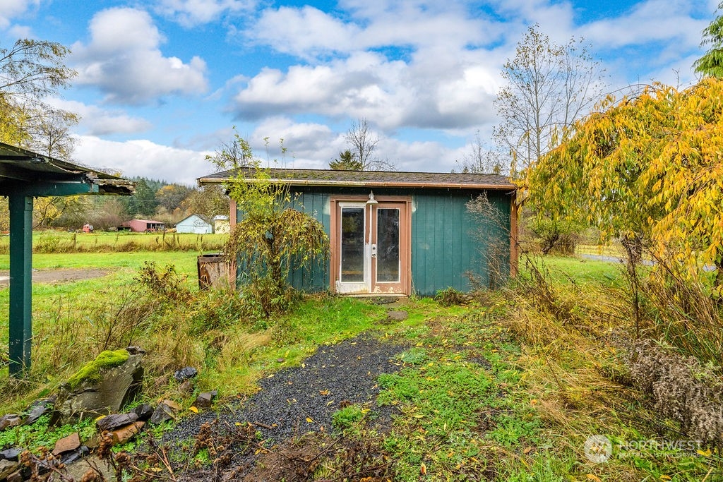 501 River Road Chehalis, WA 98532 - Photo 23 of 27 a view of a house with a yard