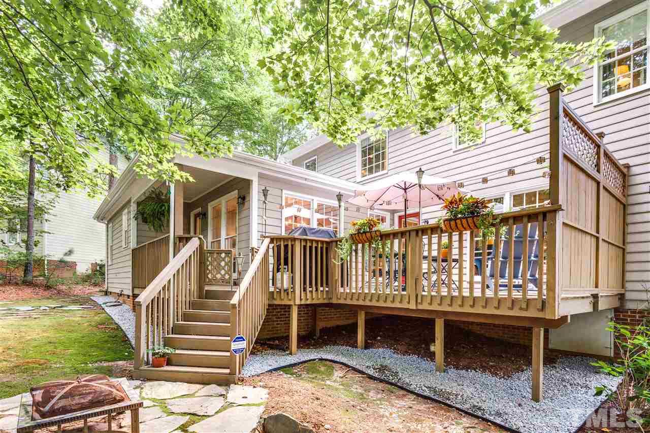 2020 Torrington Street Raleigh, NC 27615 - Photo 22 of 25 a view of a house with backyard and deck