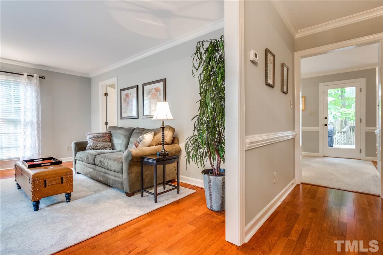 2020 Torrington Street Raleigh, NC 27615 - Photo 4 of 25 a living room with furniture and a gate