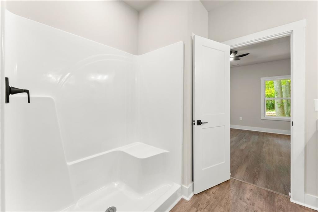 43 Anderson Street Jefferson, GA 30549 - Photo 22 of 45 a bathroom with a shower