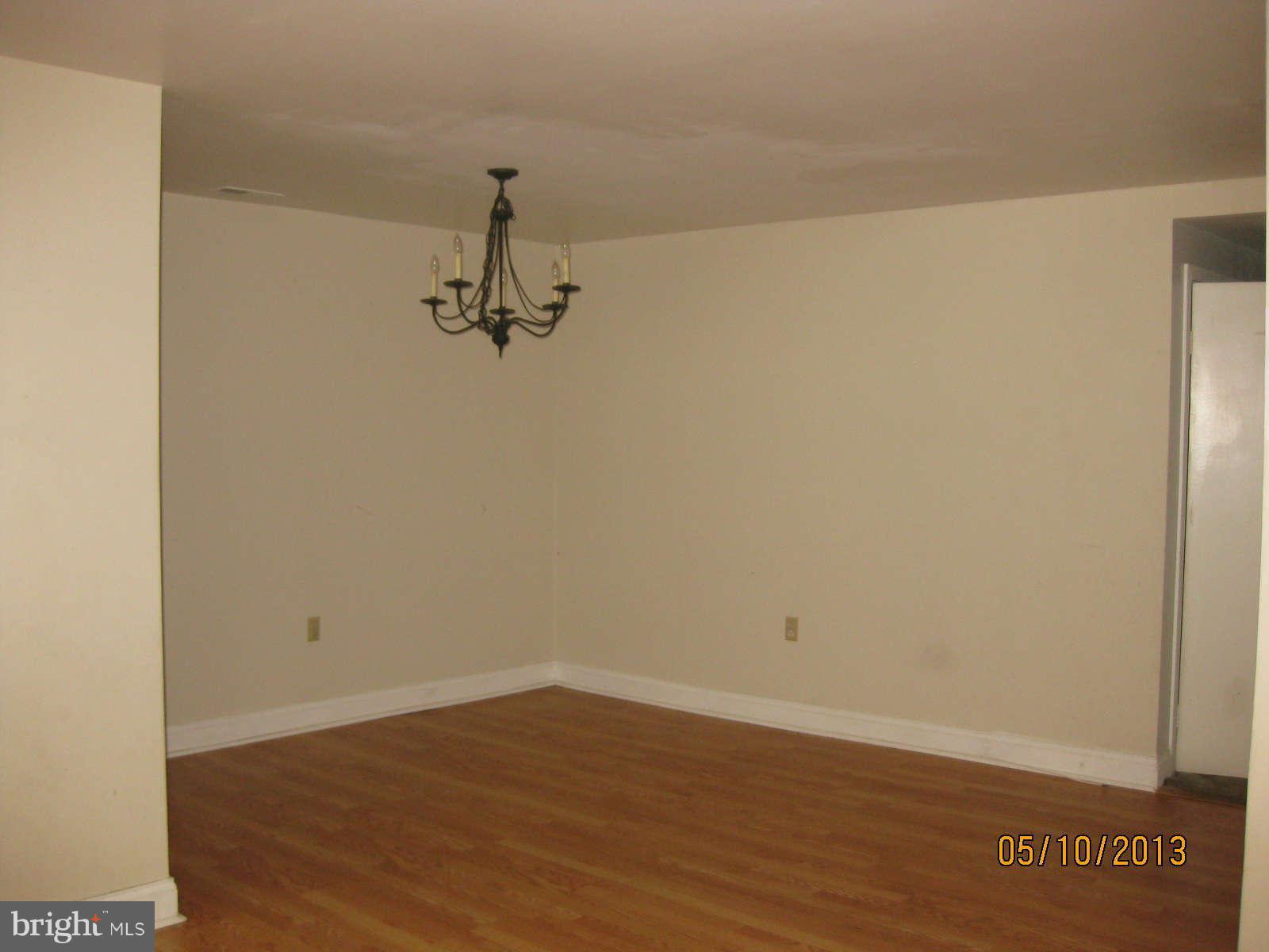 512 Charles Street, Unit R90 Baltimore, MD 21201 - Photo 4 of 10 a view of a room with wooden floor
