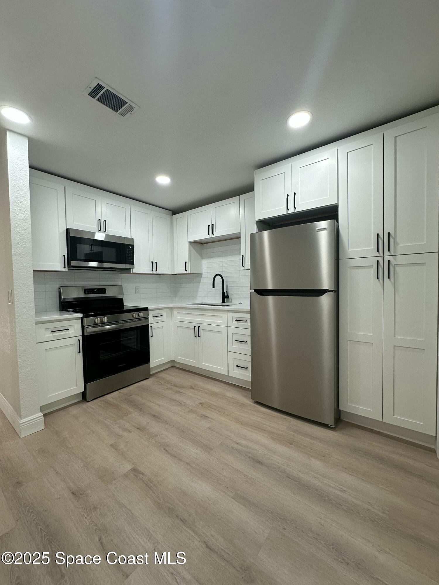 328 Bay Avenue, Unit AB Cocoa, FL 32922 - Photo 6 of 15 Kitchen 2 B