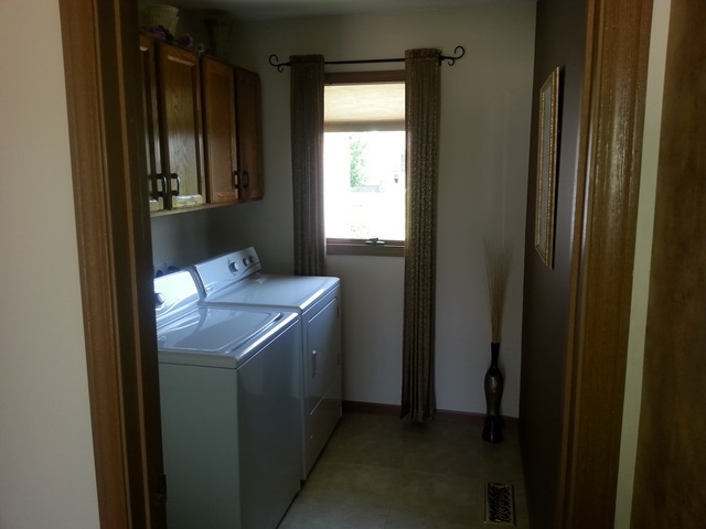 220 Willis Avenue Rochelle, IL 61068 - Photo 12 of 25 a utility room with dryer and washer
