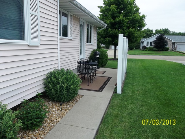 220 Willis Avenue Rochelle, IL 61068 - Photo 21 of 25 a view of a chair and table in backyard of the house