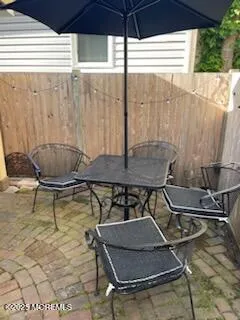 a room with gym equipment and a table