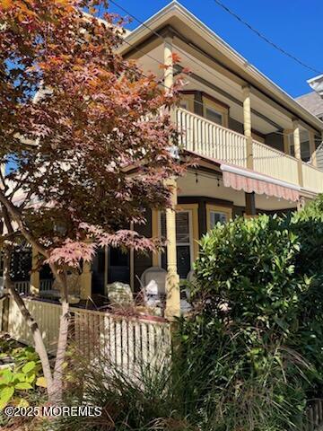 73 Stockton Avenue Ocean Grove, NJ 07756 - Photo 22 of 24 a front view of a house with a yard