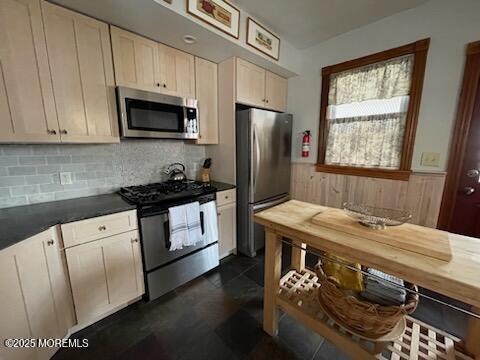 73 Stockton Avenue Ocean Grove, NJ 07756 - Photo 8 of 24 a kitchen with stainless steel appliances granite countertop a stove a sink dishwasher and a refrigerator with wooden floor