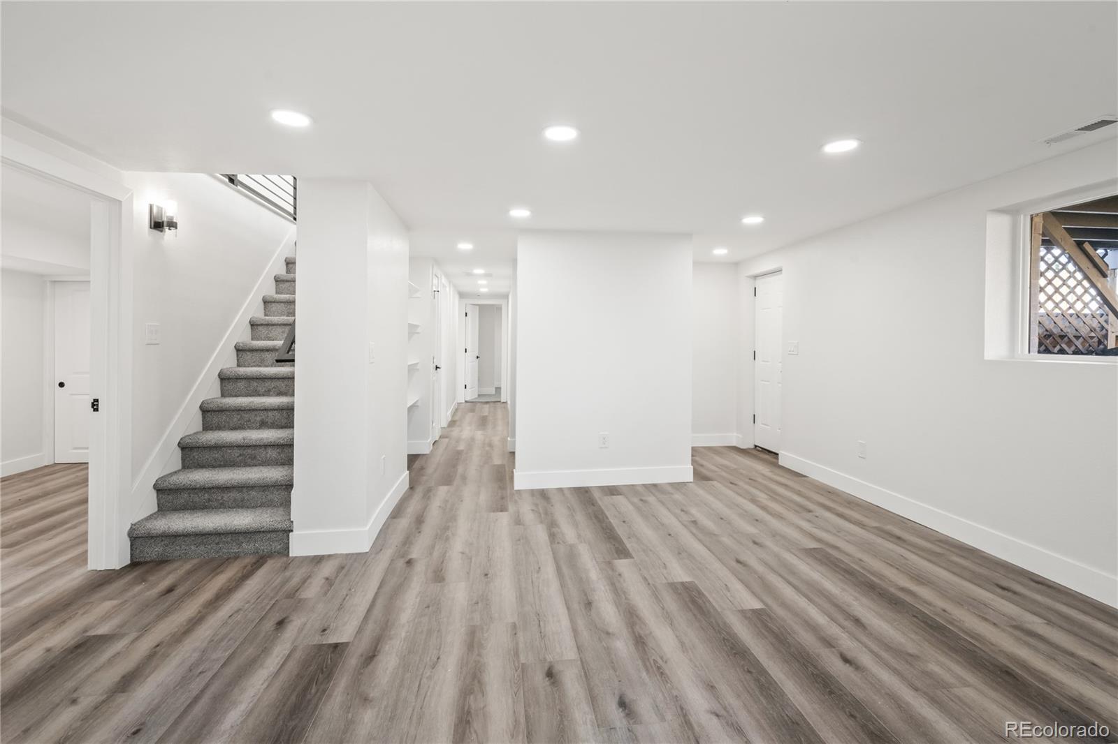 3495 Miller Street Wheat Ridge, CO 80033 - Photo 22 of 40 a view of entryway with wooden floor