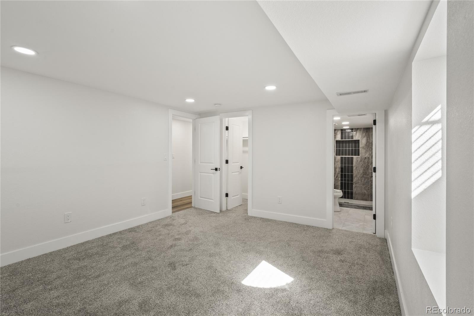 3495 Miller Street Wheat Ridge, CO 80033 - Photo 28 of 40 an empty room with an entryway