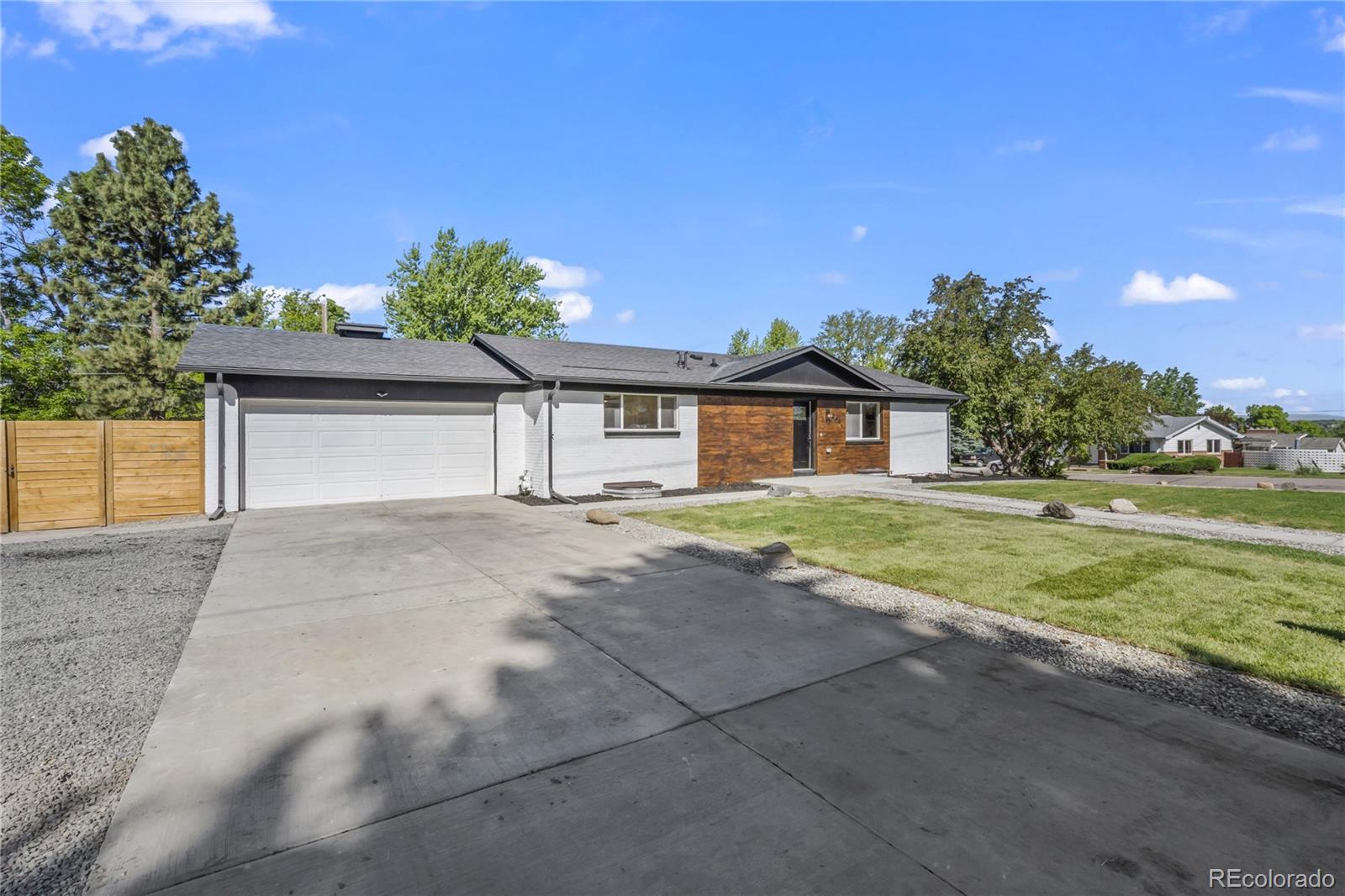 3495 Miller Street Wheat Ridge, CO 80033 - Photo 3 of 40 a house view with a outdoor space