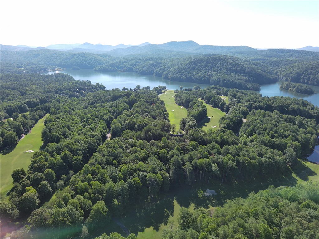 112 Links View Court Sunset, SC 29685 - Photo 2 of 9 Discover a scenic lakefront golf course nestled among rolling forested hillsides.
