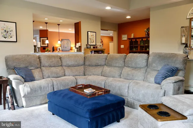 a living room with furniture and a couch