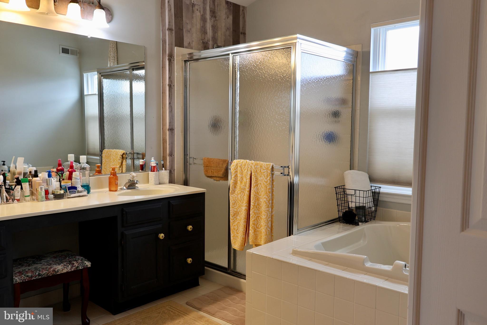 112 Preakness Drive Mount Laurel, NJ 08054 - Photo 19 of 32 a bathroom with a sink double vanity and a mirror