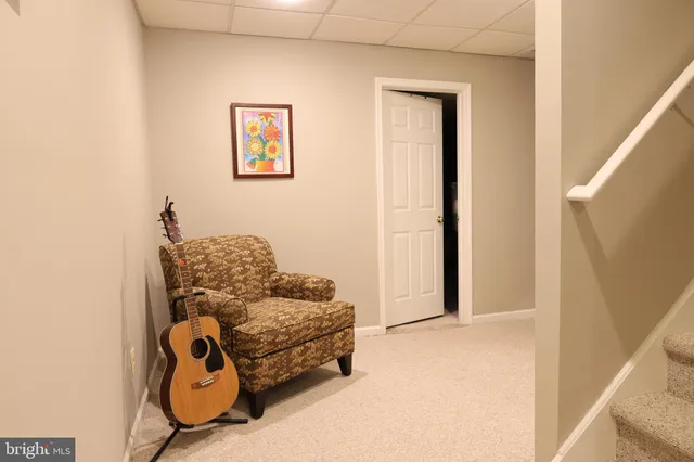 a bedroom with bed and a window