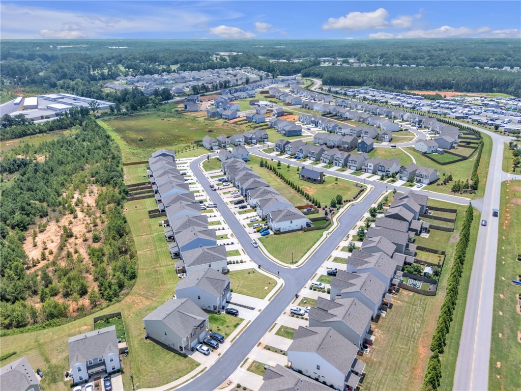 208 Samuel Street Pendleton, SC 29670 - Photo 32 of 32 An aerial perspective reveals a meticulously planned residential community with new homes.