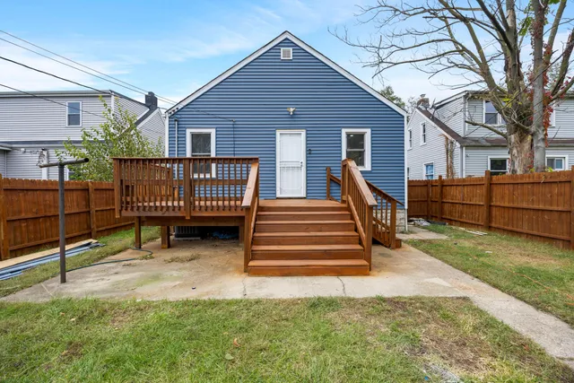 a view of a backyard of the house