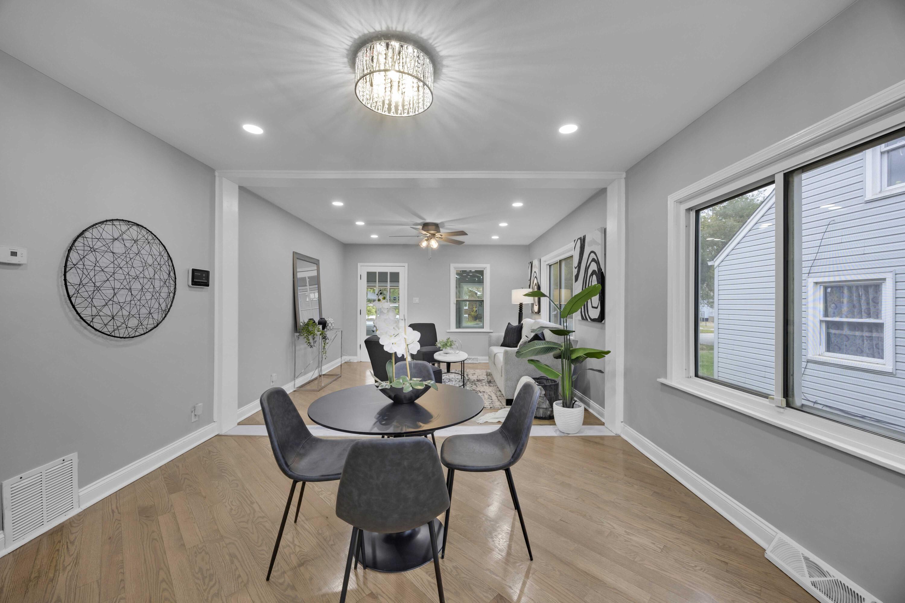 125 Marshall Street Gary, IN 46404 - Photo 6 of 23 a view of a dining room with furniture wooden floor and a window