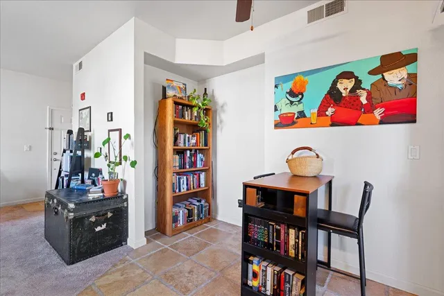 a bathroom with a sink a bathtub a mirror a vanity and a shower