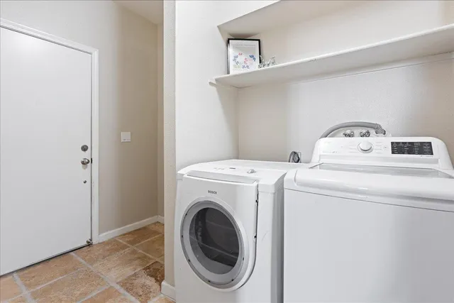 a view of a house with a garage
