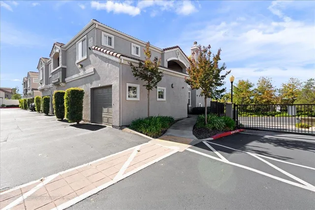 a view of a balcony with wooden floor