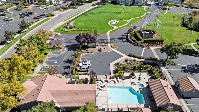 an aerial view of houses with outdoor space