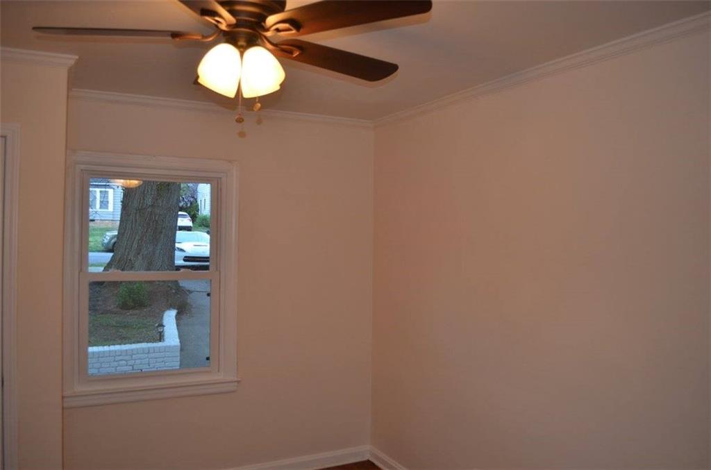 1329 Westridge Road Southwest Atlanta, GA 30311 - Photo 34 of 54 en view of a small space with wooden floor and windows