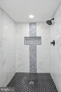 a view of a porch with wooden floor