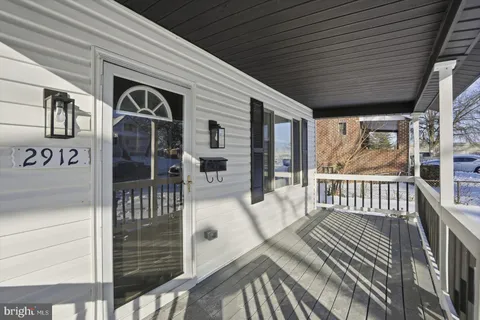 a front view of a house with patio