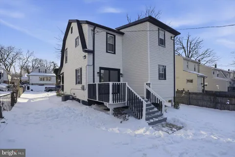 a view of a swimming pool with an ocean view