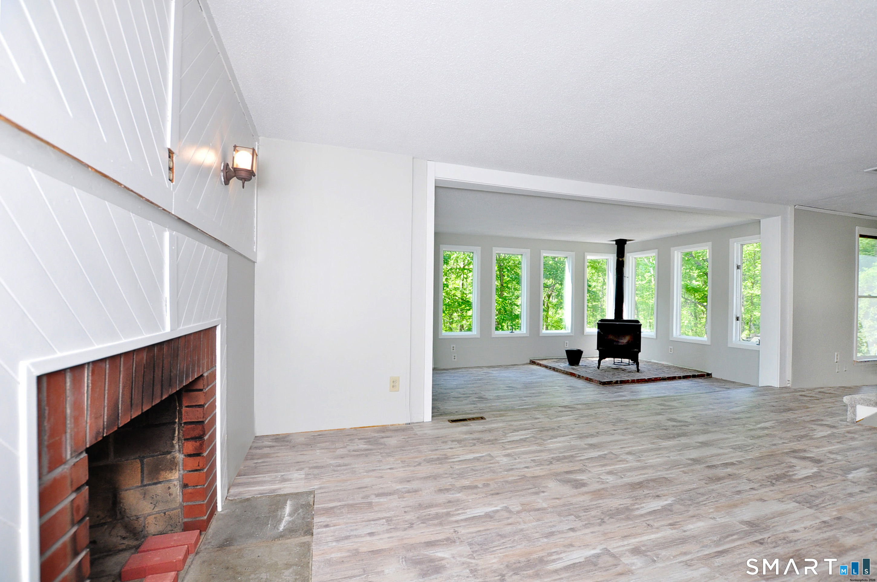 526 Granville Road Hartland, CT 06027 - Photo 13 of 37 Living room with fireplace